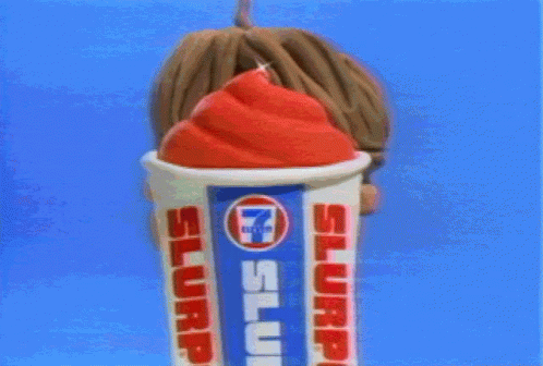 A Cartoon Character Is Holding A Cup Of Slurp Ice Cream GIF