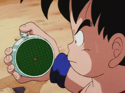 A Cartoon Character Is Holding A Device With A Red Arrow Pointing To The Center GIF