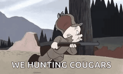 A Cartoon Character Is Holding A Gun In A Field And Saying `` We Hunting Cougars '' . GIF