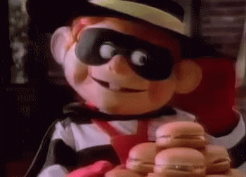 A Cartoon Character Is Holding A Pile Of Hamburgers In His Hands . GIF