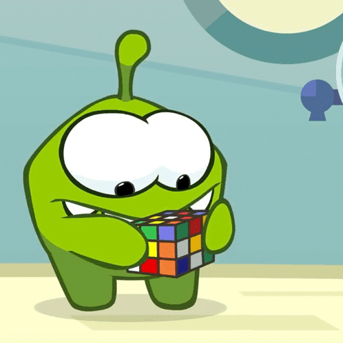 A Cartoon Character Is Holding A Rubik 'S Cube In His Hands GIF