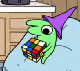 A Cartoon Character Is Holding A Rubik 'S Cube In Its Mouth . GIF