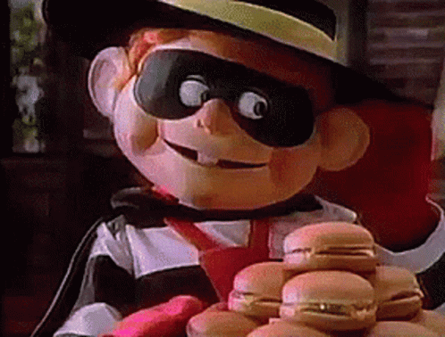 A Cartoon Character Is Holding A Stack Of Hamburgers In His Hands . GIF