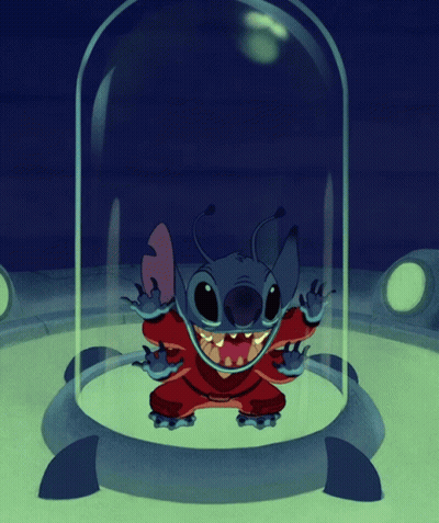 A Cartoon Character Is In A Glass Dome With Its Mouth Wide Open GIF
