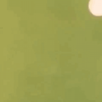 A Cartoon Character Is Kicking A Soccer Ball In The Air . GIF