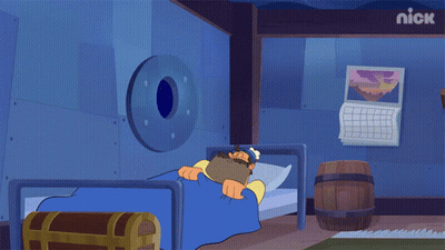 A Cartoon Character Is Laying In A Bed With A Nick Logo On The Wall Behind Him GIF