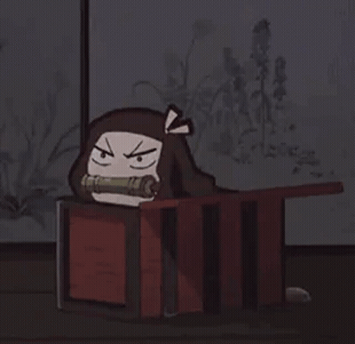 A Cartoon Character Is Laying In A Box With A Speech Bubble Coming Out Of It . GIF