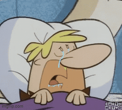 A Cartoon Character Is Laying In Bed Crying With A Tear Coming Out Of His Nose GIF
