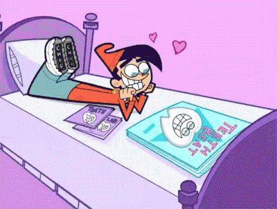 A Cartoon Character Is Laying On A Bed Next To A Book That Says ' Teddy Bear ' On It GIF