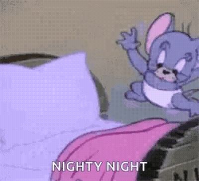 A Cartoon Character Is Laying On A Bed With A Pink Blanket On . GIF