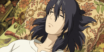 A Cartoon Character Is Laying On A Couch With A Floral Pillow GIF