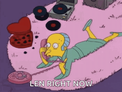A Cartoon Character Is Laying On His Stomach Talking On A Phone And The Words Len Right Now Are Above Him . GIF