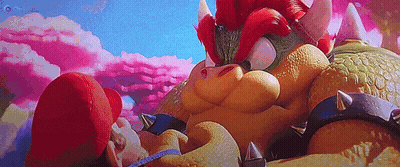 A Cartoon Character Is Laying On The Ground Next To A Giant Cartoon Character . GIF