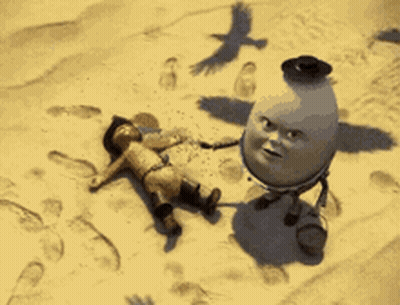 A Cartoon Character Is Laying On The Ground Next To An Egg With A Face GIF