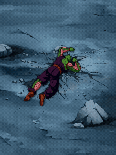 A Cartoon Character Is Laying On The Ground With A Cracked Wall Behind Him GIF