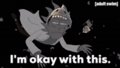 A Cartoon Character Is Laying On The Ground With The Words `` I 'M Okay With This '' Written On It . GIF
