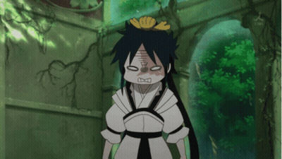 A Cartoon Character Is Making A Funny Face And Has A Yellow Flower In Her Hair GIF