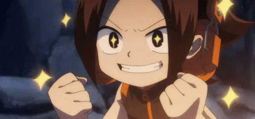A Cartoon Character Is Making A Funny Face With Her Fist In The Air . GIF