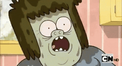 A Cartoon Character Is Making A Funny Face With His Mouth Wide Open . GIF