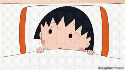 A Cartoon Character Is Peeking Out From Under A Blanket In Bed . GIF