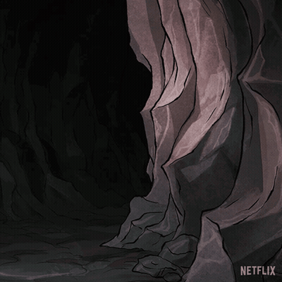 A Cartoon Character Is Peeking Out Of A Cave And Says Hello Netflix GIF