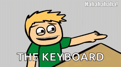 A Cartoon Character Is Pointing At A Keyboard With The Words " The Keyboard " Below Him GIF
