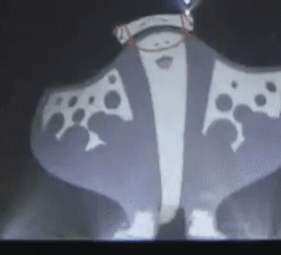 A Cartoon Character Is Projected On A Wall . GIF