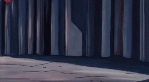 A Cartoon Character Is Running In A Dark Room GIF