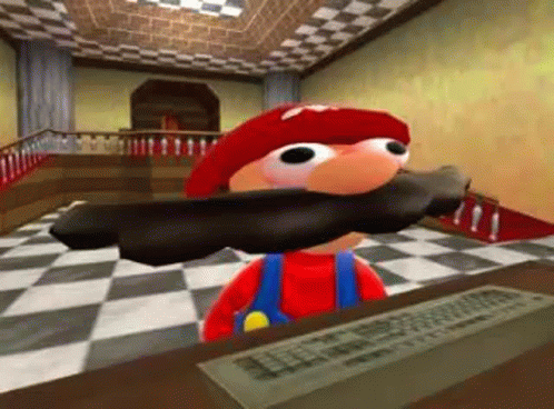 A Cartoon Character Is Sitting At A Desk With A Computer Keyboard And A Mustache . GIF