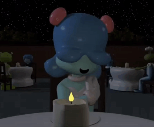 A Cartoon Character Is Sitting At A Table With A Candle Lit Up GIF