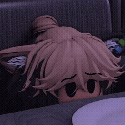 A Cartoon Character Is Sitting At A Table With A Plate In Front Of Him GIF