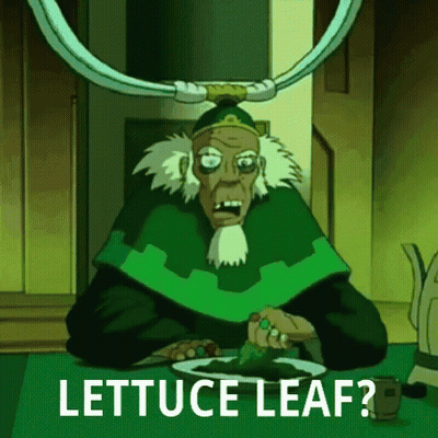 A Cartoon Character Is Sitting At A Table With A Plate Of Lettuce And The Words `` Lettuce Leaf '' . GIF