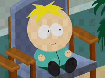 A Cartoon Character Is Sitting In A Chair And Looking At The Camera GIF