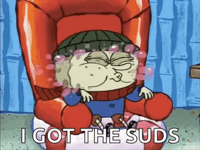 A Cartoon Character Is Sitting In A Chair And Saying I Got The Suds GIF
