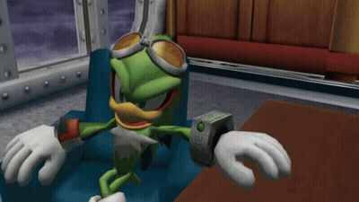 A Cartoon Character Is Sitting In A Chair With A Watch On His Wrist That Says ' Sonic ' On It GIF