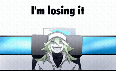 A Cartoon Character Is Sitting In Front Of A Computer Screen With The Words `` I 'M Losing It '' Written On It . GIF