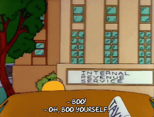 A Cartoon Character Is Sitting In Front Of An Internal Revenue Service Sign GIF