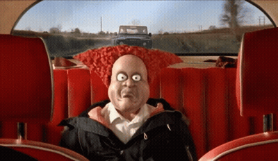 A Cartoon Character Is Sitting In The Back Of A Car GIF