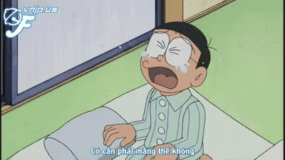 A Cartoon Character Is Sitting On A Bed With A Pillow And Says Minh Moi Ve Khuya Mot Chut Thoi Ma GIF