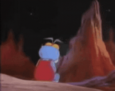 A Cartoon Character Is Sitting On A Rock And Looking Sad GIF