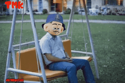 A Cartoon Character Is Sitting On A Swing With Tmk On The Bottom Right GIF