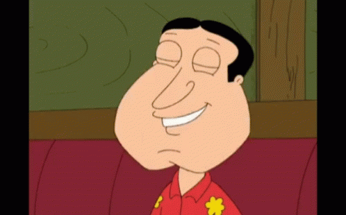 A Cartoon Character Is Smiling With His Eyes Closed And Wearing A Red Shirt With Flowers On It GIF
