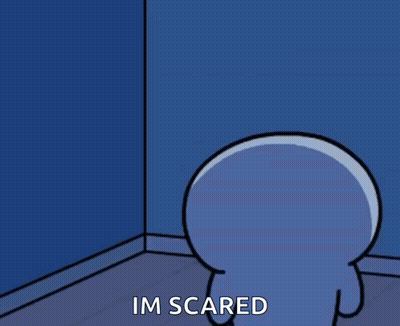 A Cartoon Character Is Standing In A Corner And Says I 'M Scared . GIF