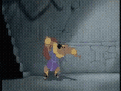 A Cartoon Character Is Standing In A Dark Room Holding A Large Object . GIF