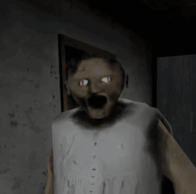 A Cartoon Character Is Standing In A Dark Room With His Eyes Glowing . GIF