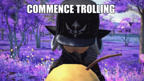 A Cartoon Character Is Standing In A Field Of Purple Flowers With The Words Commence Trolling Above Him GIF
