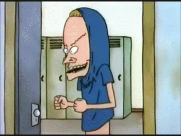 A Cartoon Character Is Standing In A Locker Room Wearing A Blue Shirt And A Hood . GIF