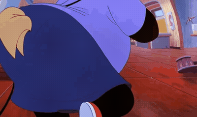 A Cartoon Character Is Standing In A Room With A Purple Shirt On . GIF