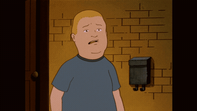 A Cartoon Character Is Standing In Front Of A Brick Wall And A Mailbox GIF