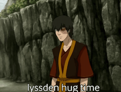 A Cartoon Character Is Standing In Front Of A Rock Wall And The Caption Says Lyssden Hug Time GIF